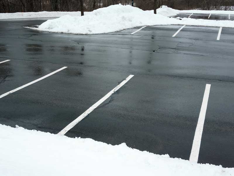 parking lot with snow around the side